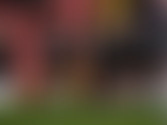 Kirsty Hanson celebrates scoring for Villa at Brisbane Road vs. Spurs