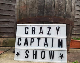 Sign showing 'Crazy Captain Show'