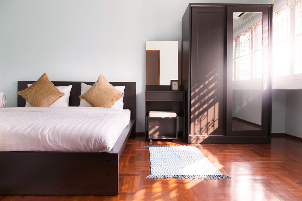 Bedoom with wardrobe and rug
