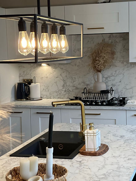 Grey kitchen with marble worktops