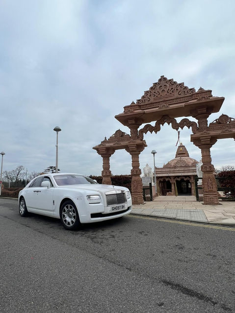 White luxury car for hire