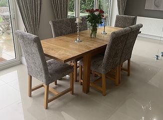 Four re-upholstered velvet chairs in dining room