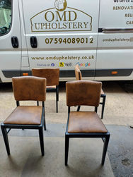 Tan dining chairs after re-upholstery