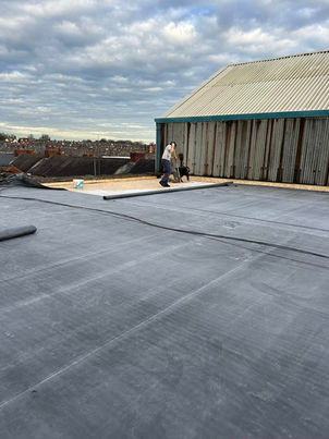 Rubber roof being fitted at Qualter hall Barnsley