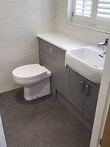 Grey bathroom unit and toilet