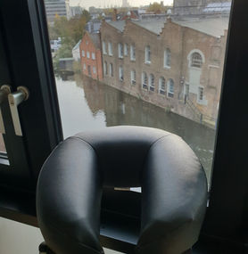 Massage chair with view over canal