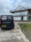 SRD Bricklaying Ltd van outside construction of house