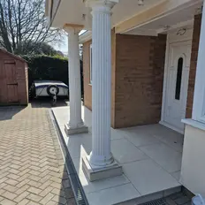 Decorative white pillars at a house entrance in Sprowston
