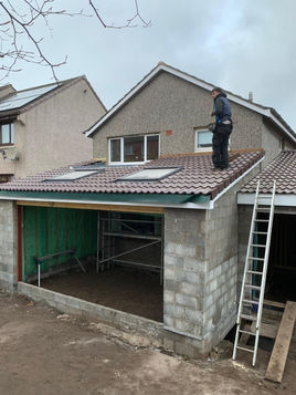Installing a new tiled roof on a house extension