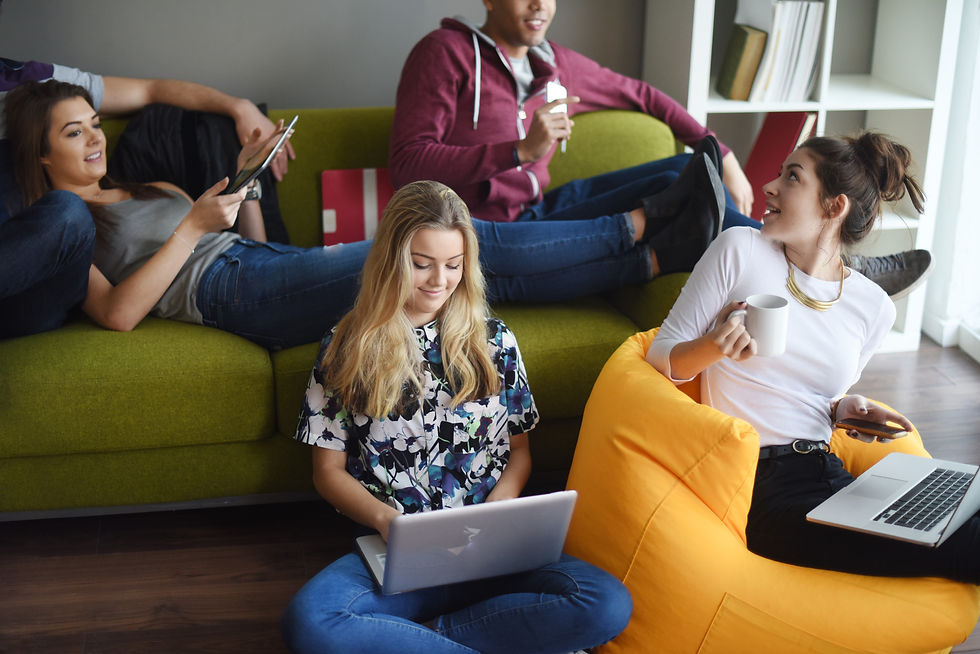 Group of teenagers relaxing on bean bags