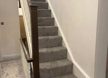 Newly carpeted stairs of loft conversion