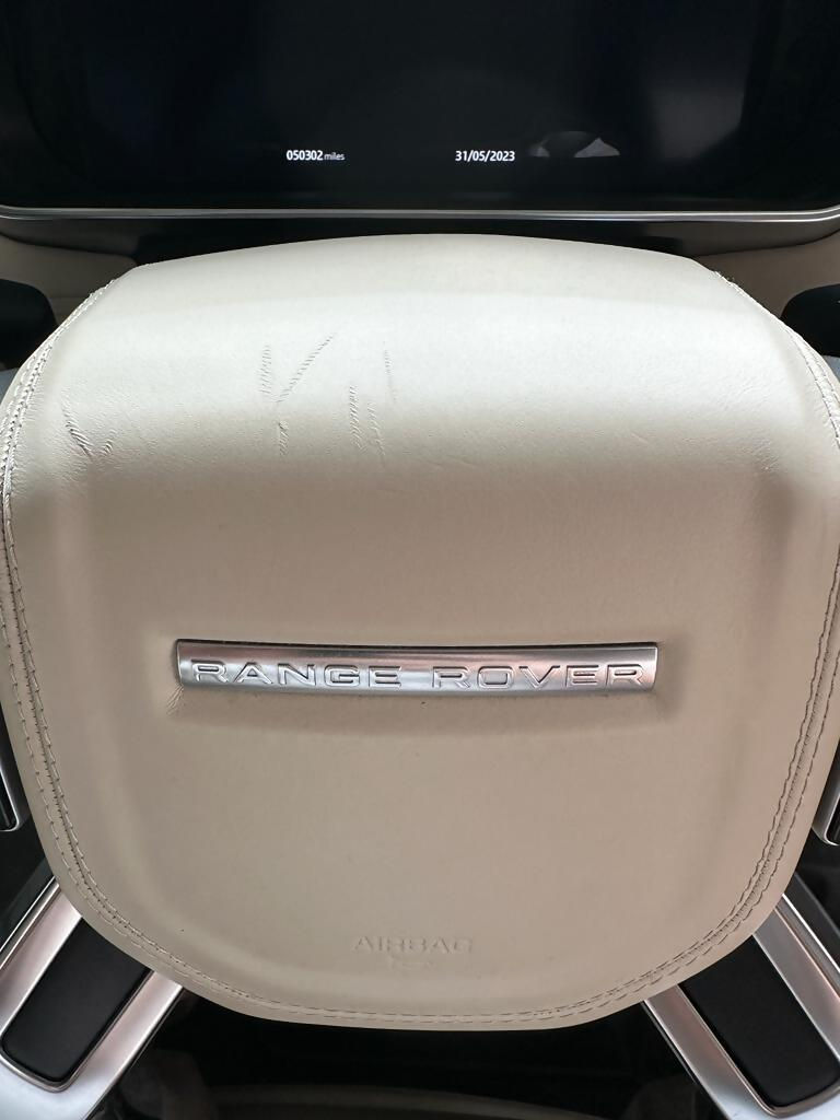 BEFORE: Steering wheel centre repair