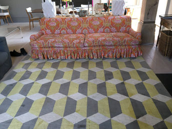 Yellow and grey rug after cleaning
