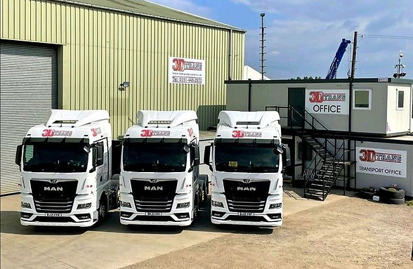 3D Trans Ltd lorries parked outside of warehouse