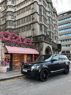 Black car outside hotel