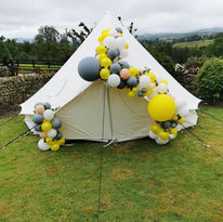 Yellow and grey balloon display