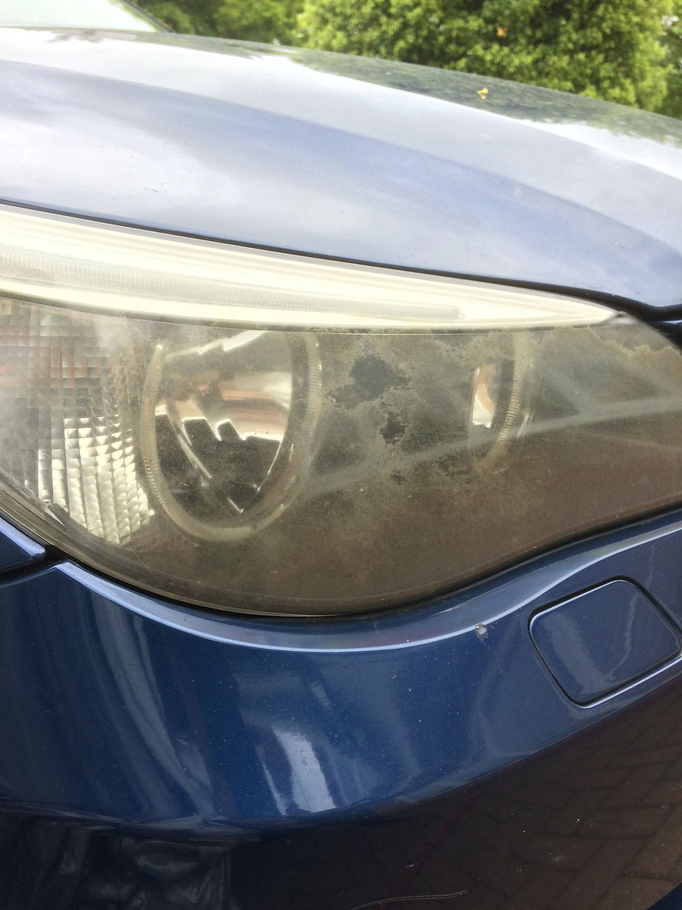 BEFORE: Headlight restoration on a BMW 5 Series