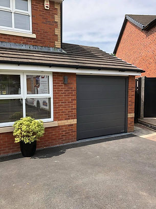 Modern sectional garage door installed by Allandor in Blackburn