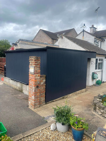 New cladding on garage
