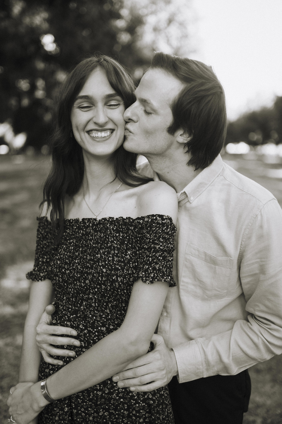 Boy kisses girl on cheek