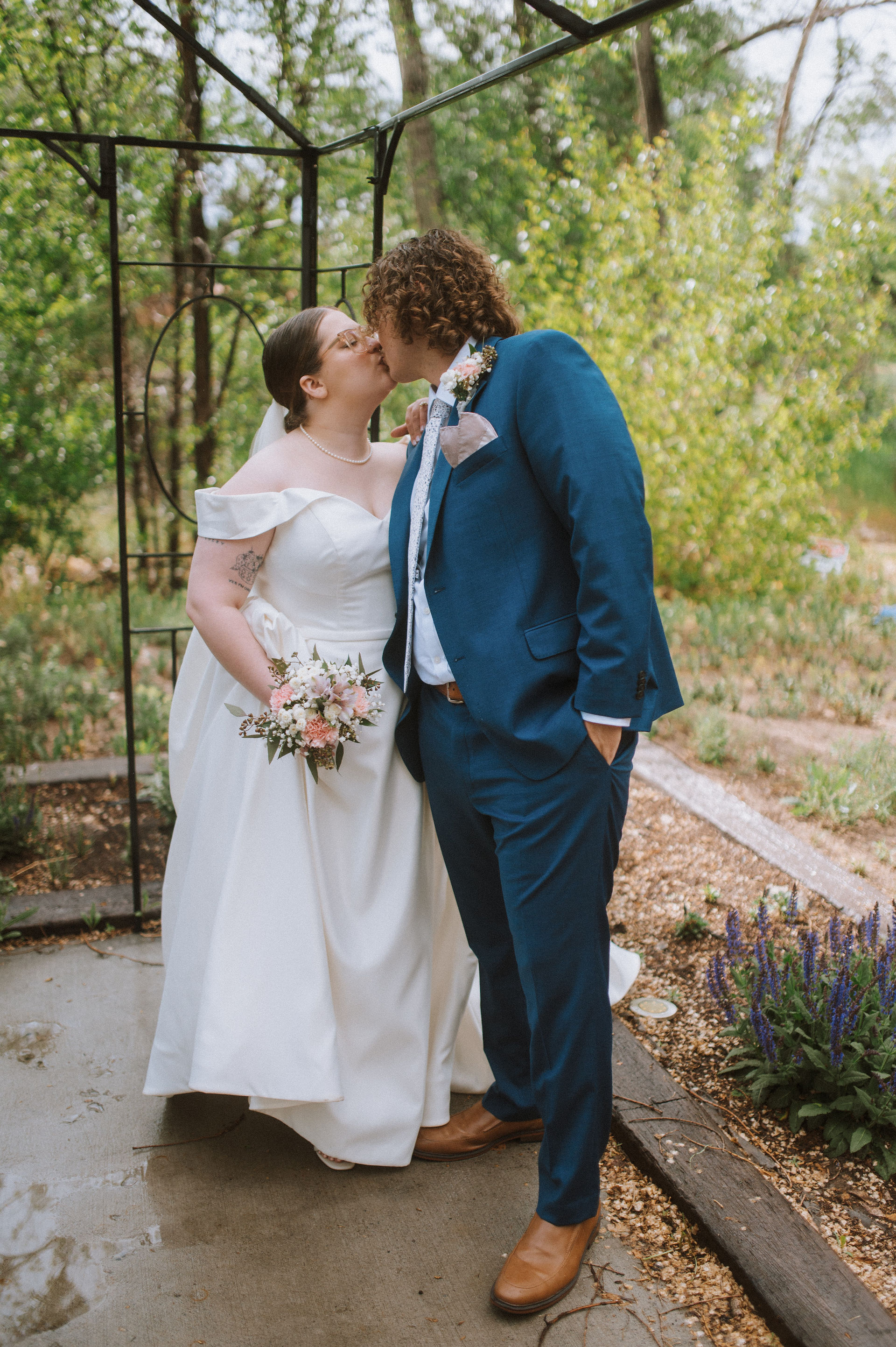 Portrait of a couple kissing on their wedding day in Santa Fe, New Mexico.