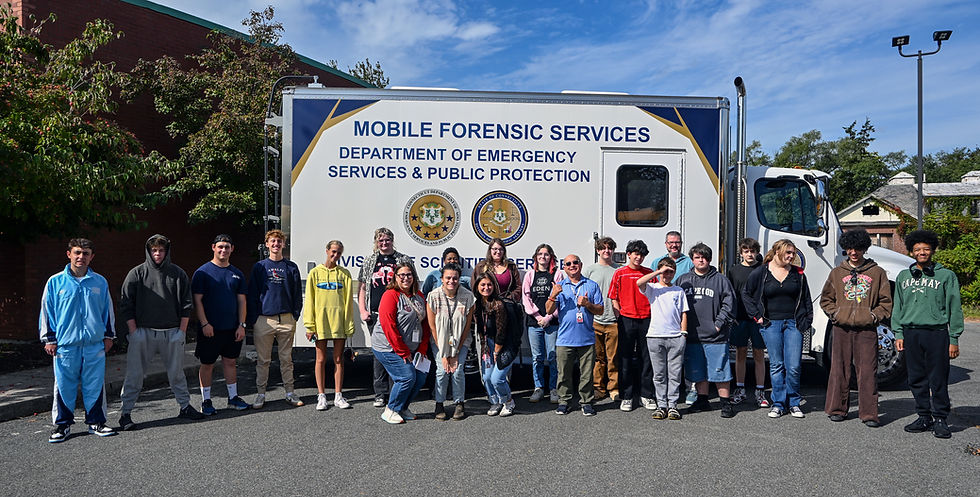 Students in front of Mobile Forensic Services Vehicle
