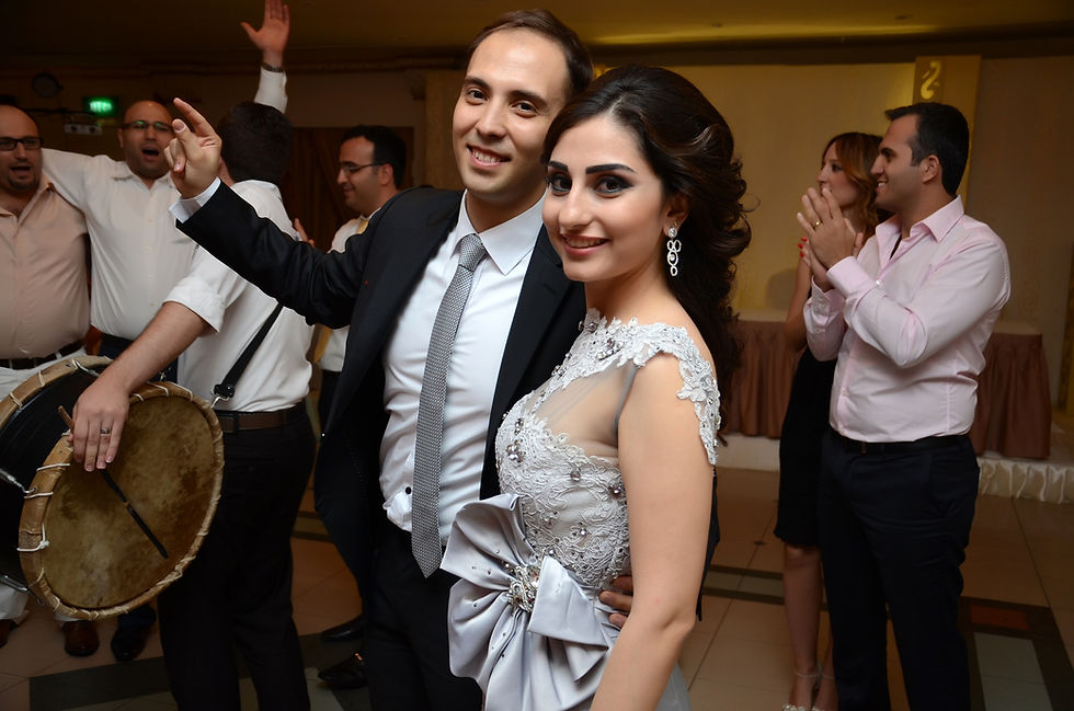 Lucia Loxca e seu marido Abed Tokmaji em evento na Síria