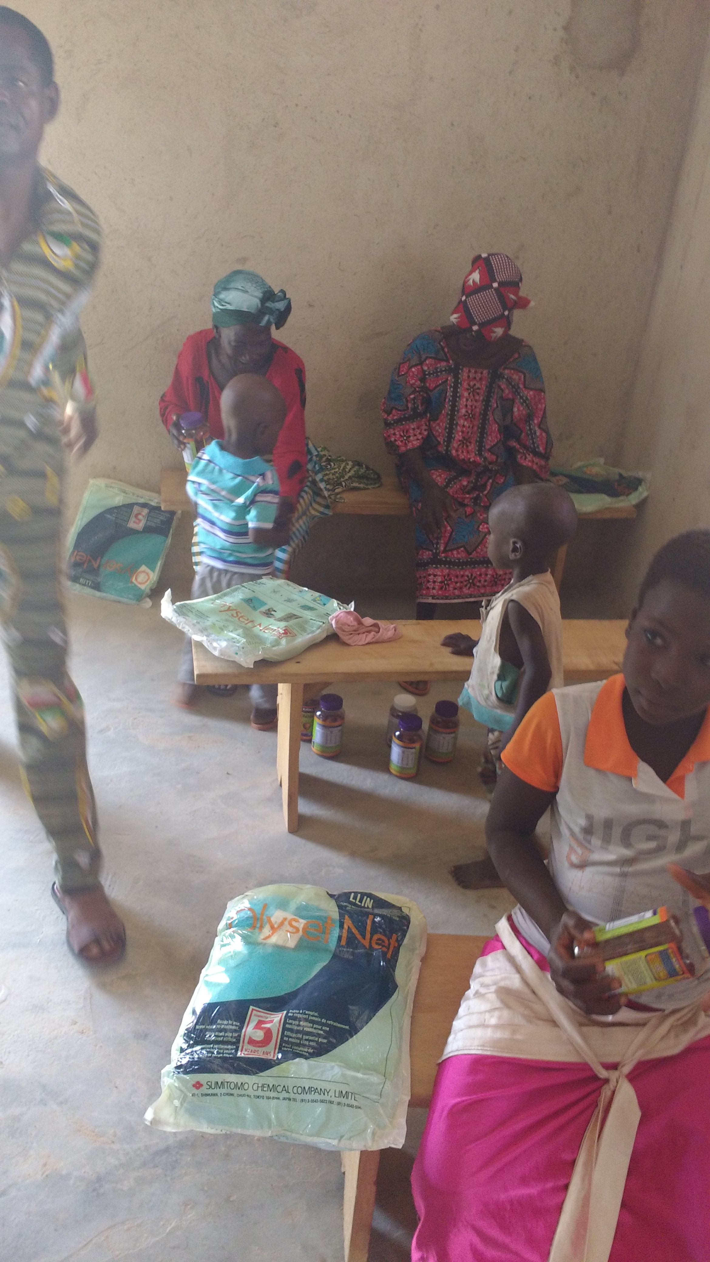 Mosquito net & vitamin distribution
