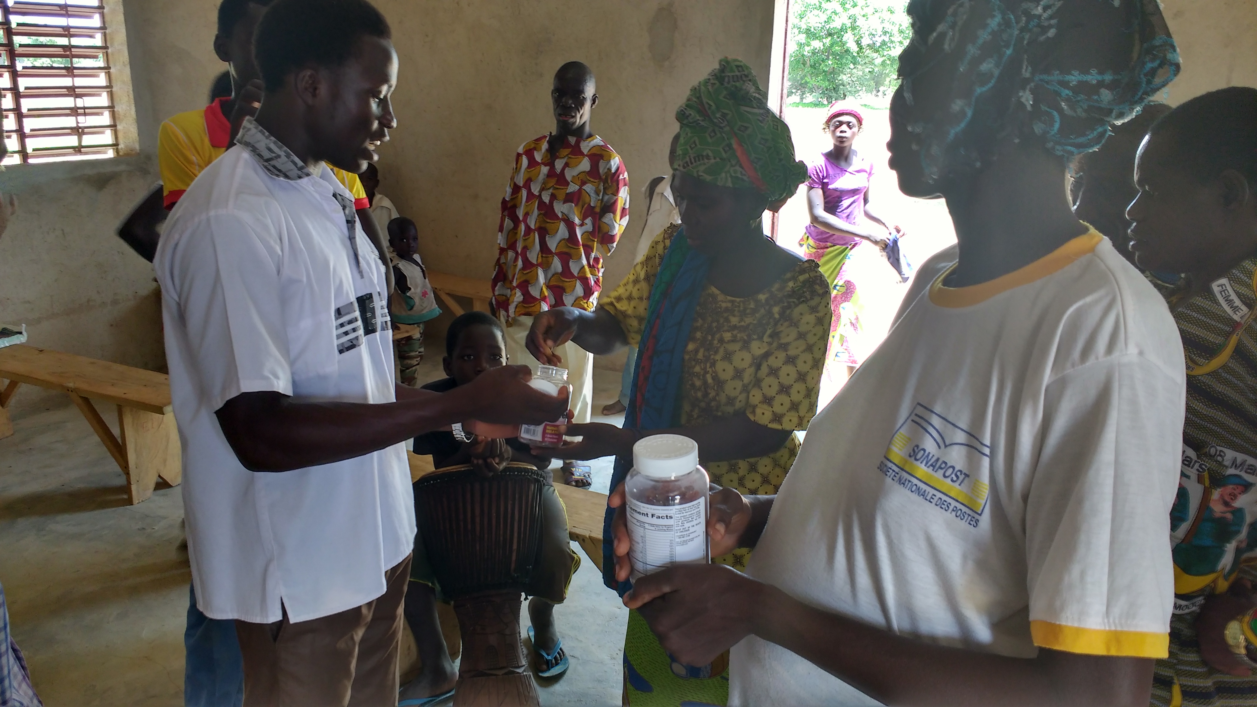 Mosquito net & vitamin distribution