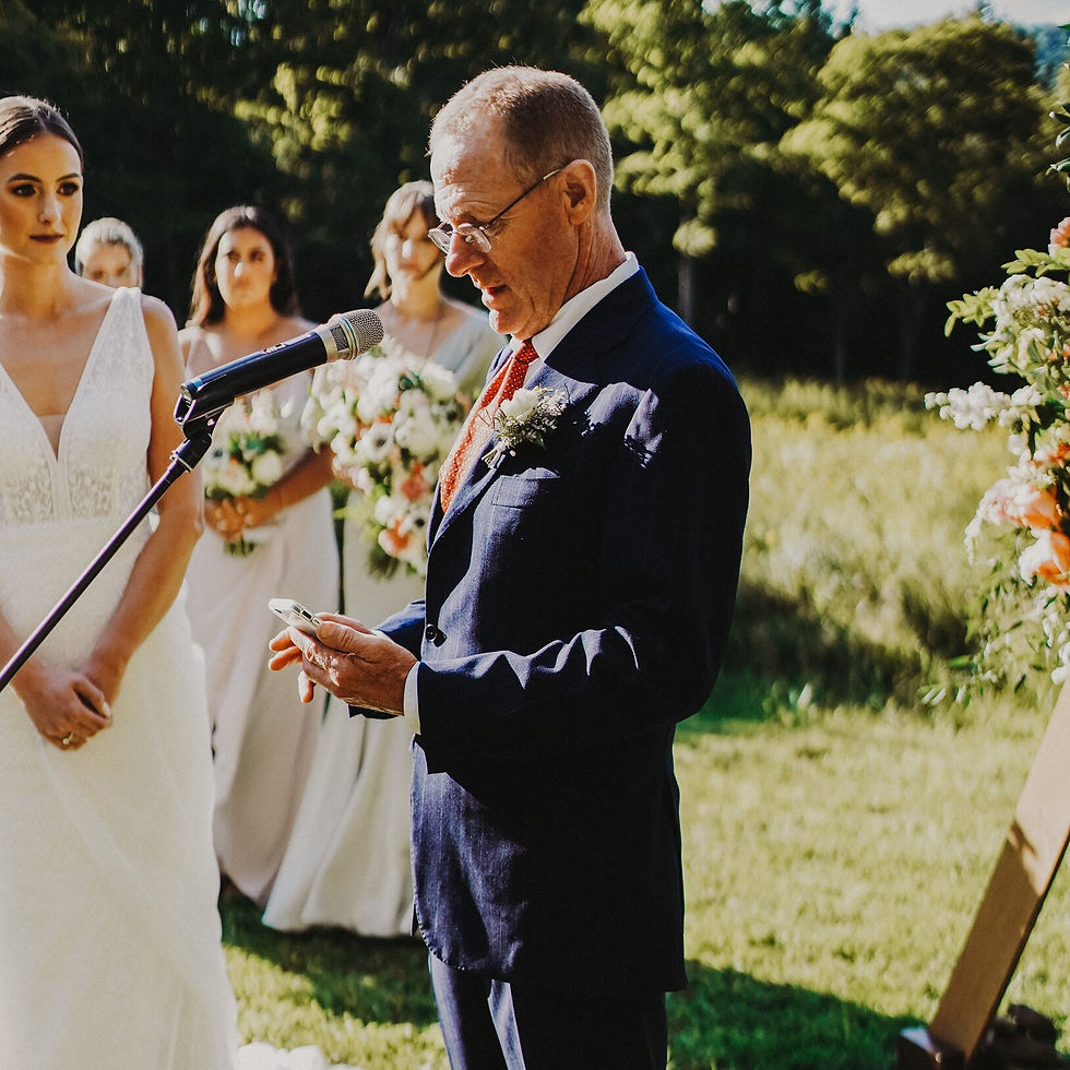 Wedding officiant with bride