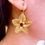 Thumbnail: FRANGIPANI VENUS EARRINGS in gold