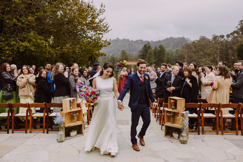 Bride and groom walking down the aisle at the Brazilian Room in Berkeley, CA