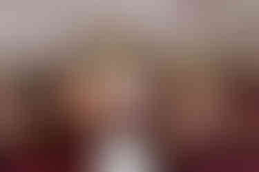 Bridemaids under cherry blossoms at spring wedding at the Brazilian Room in Berkeley, CA