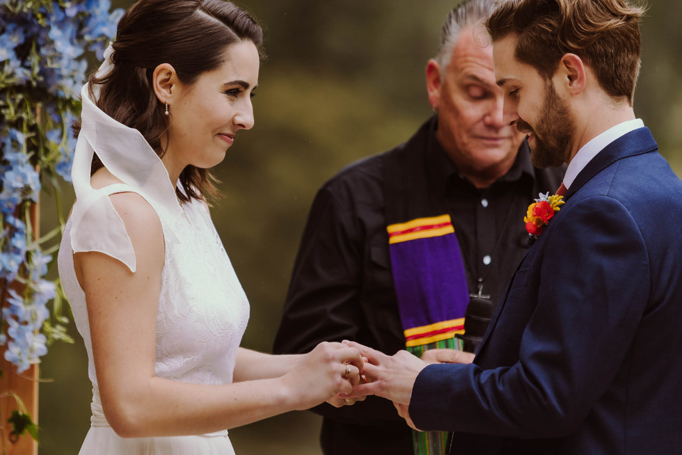 Exchanging rings at the Brazilian Room in Berkeley, CA