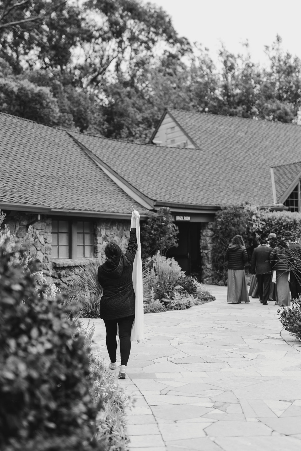Carrying wedding dress at the Brazilian Room in Berkeley, CA