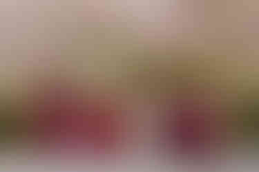 Bridemaids under cherry blossoms at spring wedding at the Brazilian Room in Berkeley, CA