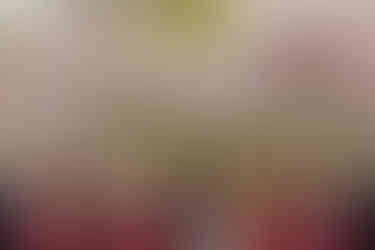 Groomsmen under cherry blossoms at spring wedding at the Brazilian Room in Berkeley, CA