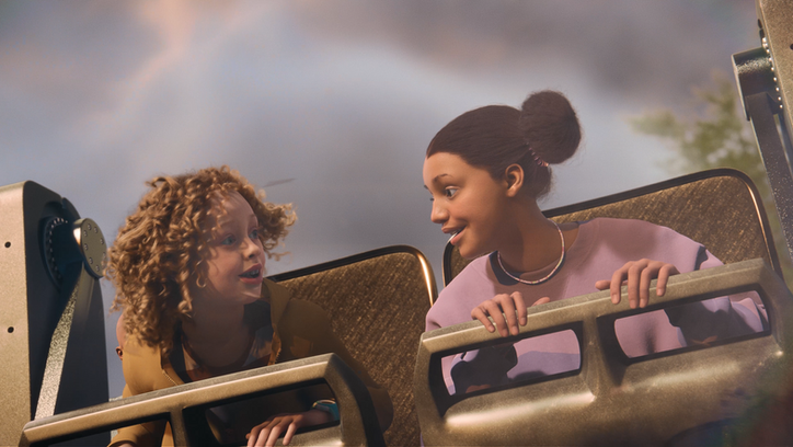 Kids smiling on a Futuroscope ride attraction