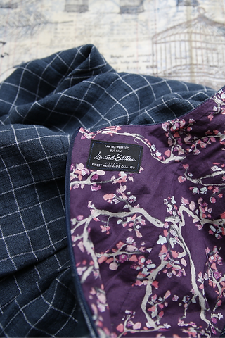 Back label on Lilou Dress saying I am not perfect but I am Limited Edition