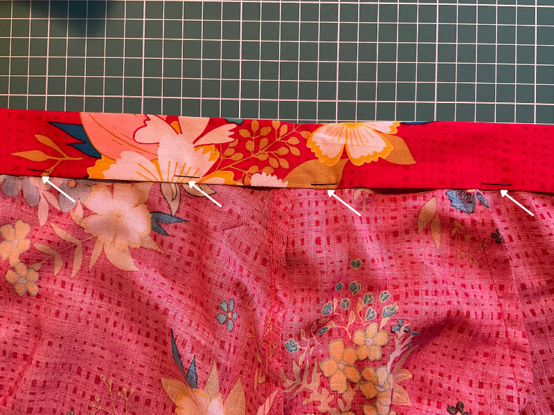 Inside view of Art Gallery Fabrics summerdress Dreams rayon challis on the Liberty Zina Wrap Skirt / Simplicity 8606, showing the waistband pinned along the seam where it meets the skirt to ensure it catches the inside waistband