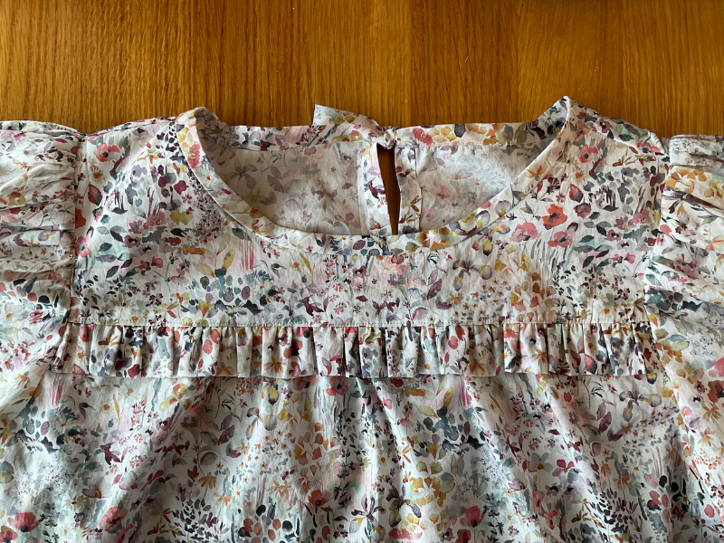 Close up view of top half of Sagebrush Top showing shoulders, neckline and ruffle in Liberty Tana Lawn Felda fabric