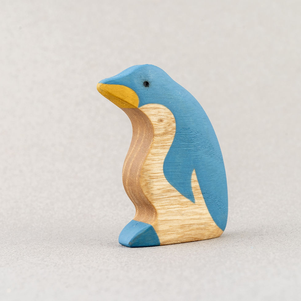 Thumbnail: Handmade wooden Penguin figurine on soft blue and natural wood, eco-friendly toy inspired by Waldorf play