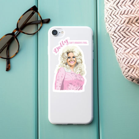 A pink and white illustrated sticker of Dolly Parton, country music singer and cowgirl. It adorns a mobile phone.