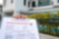 The foreman is review on building inspection report form to QC building quality of the hou