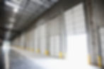 Sectional doors at loading gates