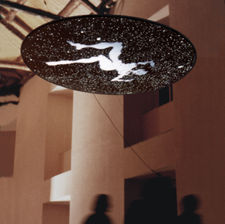 Spazio San Leucio
proiezione su schermo circolre, dimensioni determinate dall'ambiente, 1998
Le cellule del corpo nascono e muoiono continuamente formando un’esistenza più grande, la nostra. La nascita e la morte delle stelle che compongono le galassie formano una vita più grande, la vita dell’universo.
Un flusso continuo di nascite e morti crea una vita cosmica dove gli esseri viventi come le cose inanimate dipendono l’uno dall'altro.
Il corpo fluttua nell’assenza di suono, nella mancanza di colore e si disperde. La realtà si rivela, la luce intrinseca all’esistenza è condotta verso il buio inevitabile della vita formale, il mondo è una protesi per l’anima.
L’installazione è stata realizzata per la mostra d’arte LA MACCHINA DEI SOGNI al Belvedere di San Leucio (CE) promossa dall’associazione culturale Mediarte in collaborazione con il comune di Caserta, Proloco dì Caserta, a cura di Massimo Sgroi.
Rassegna stampa: IL MATTINO martedì 15 dicembre 1998
Corriere di Caserta martedì 15 dicembre 1998
IL MATTINO domenica 13 dicembre 1998
Catalogo: LA MACCHINA DEI SOGNI, Erregraph, 1998