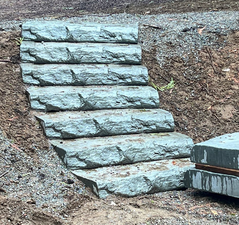 VertiBlock stairs built into native hill.