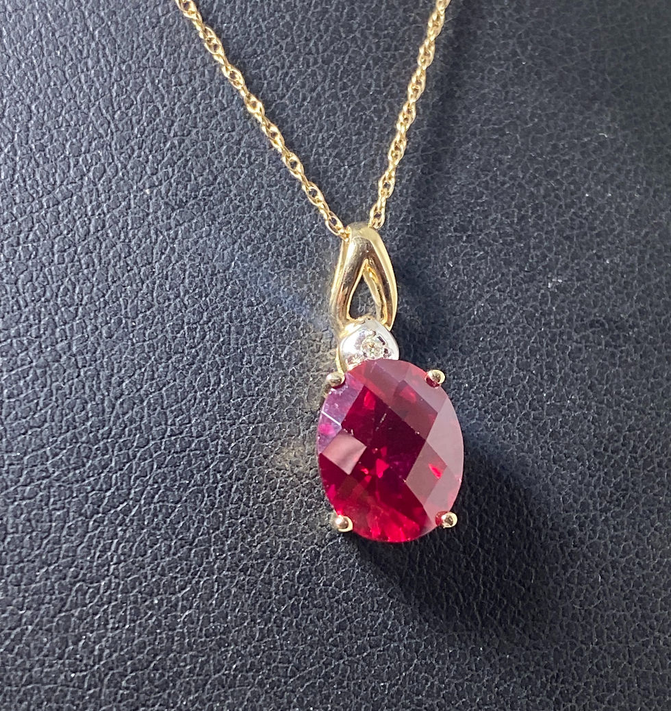 9K Yellow Gold Synthetic Ruby & Diamond Pendant on matching 10K Gold Chain