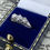 Thumbnail: Retro Three-Stone 0.60ct Transitional Cut Diamond Ring in Platinum & 18K Gold