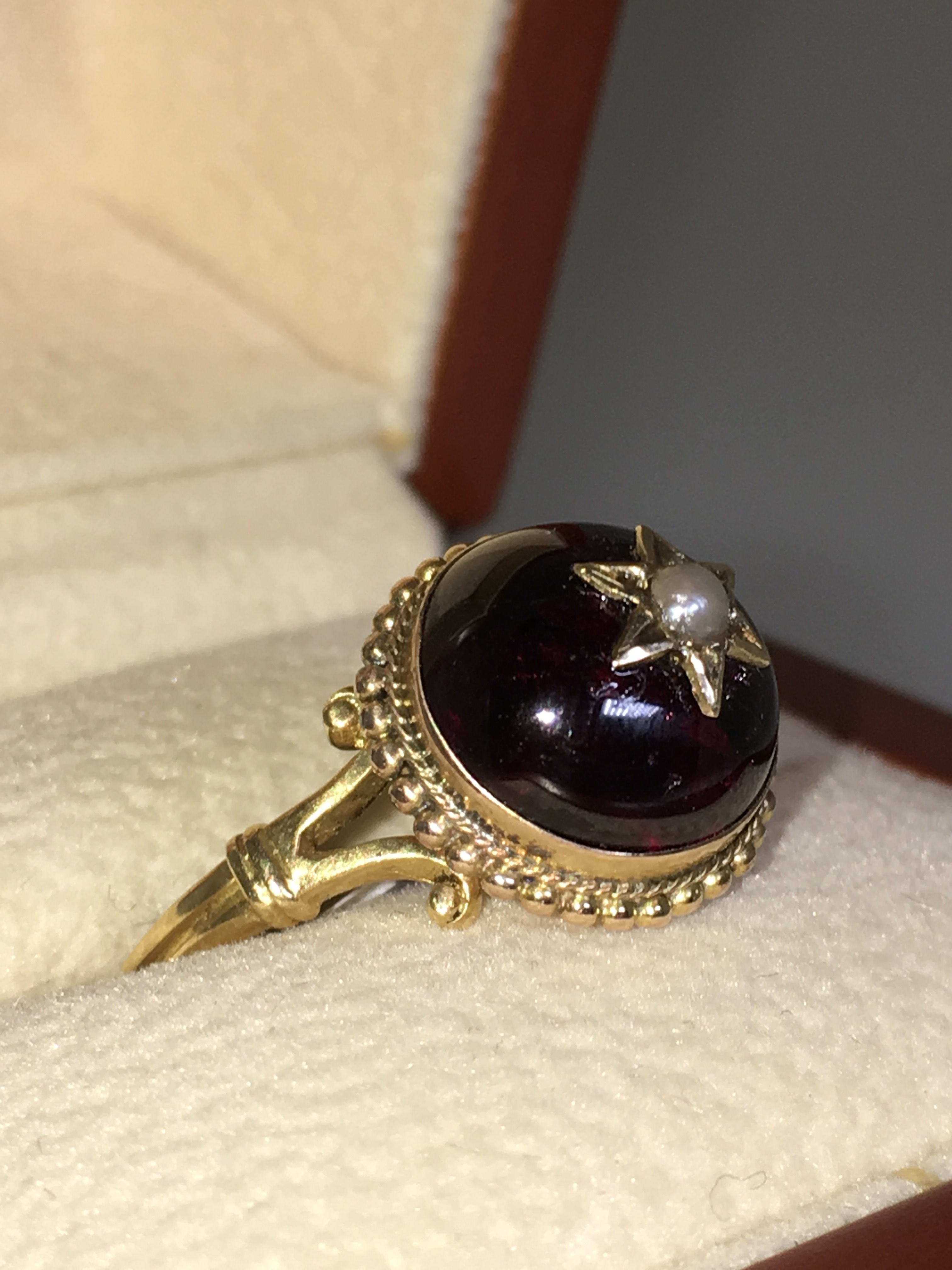 An Antique (Victorian) Cabochon Garnet, Seed Pearl Ring in 18K Yellow Gold
